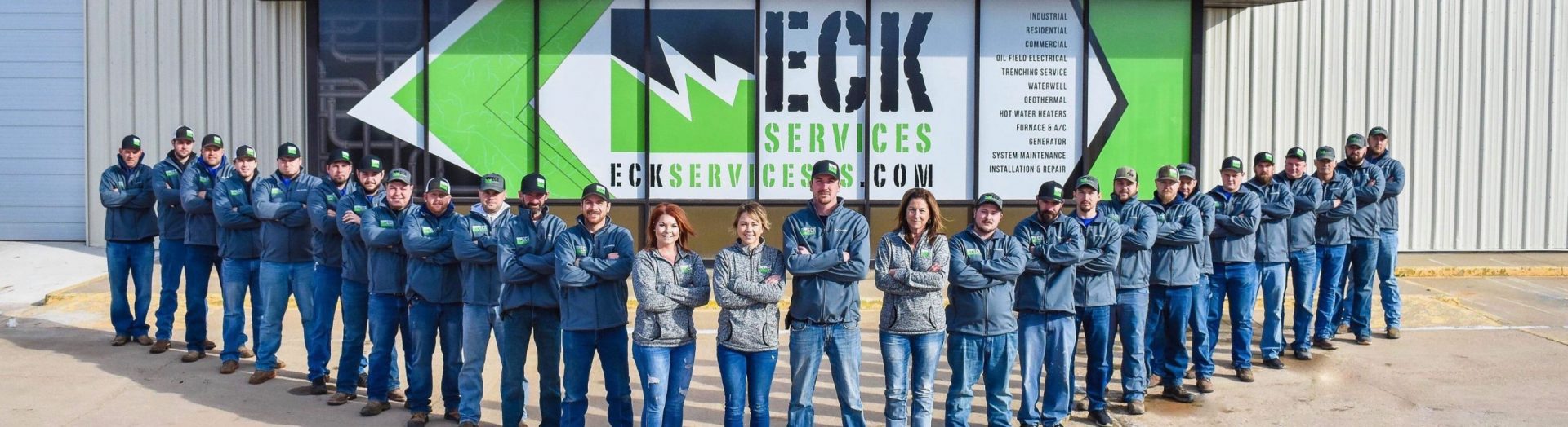 group photo of eck service's employees