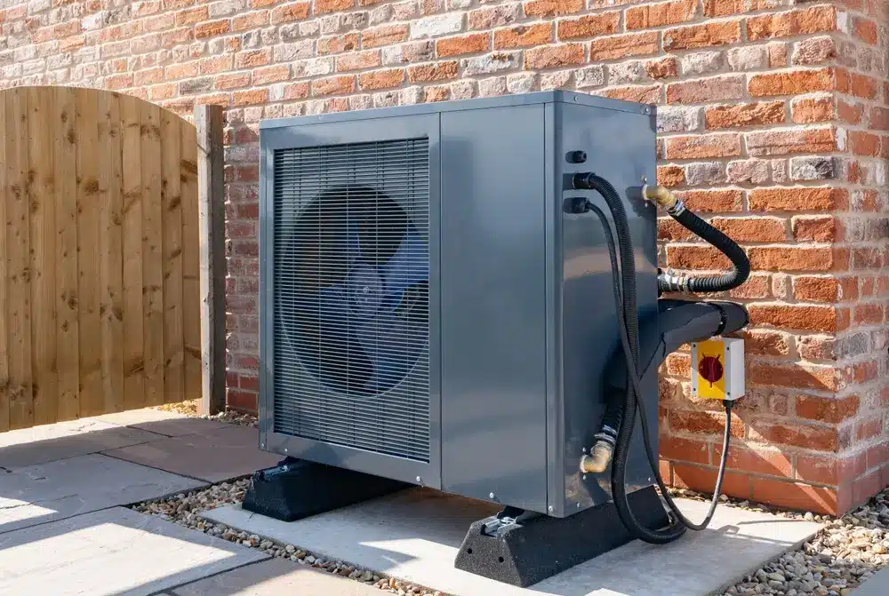 air source heat pump installed outside of Wichita home